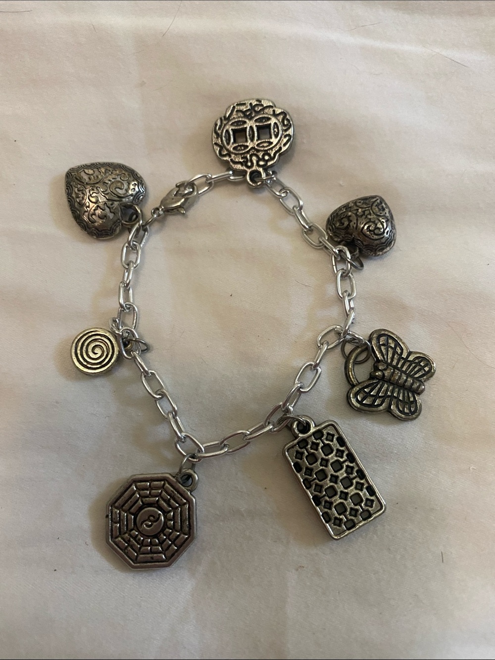 Silver Tone Charm Bracelet with Hearts, Butterfly & Geometric Charms